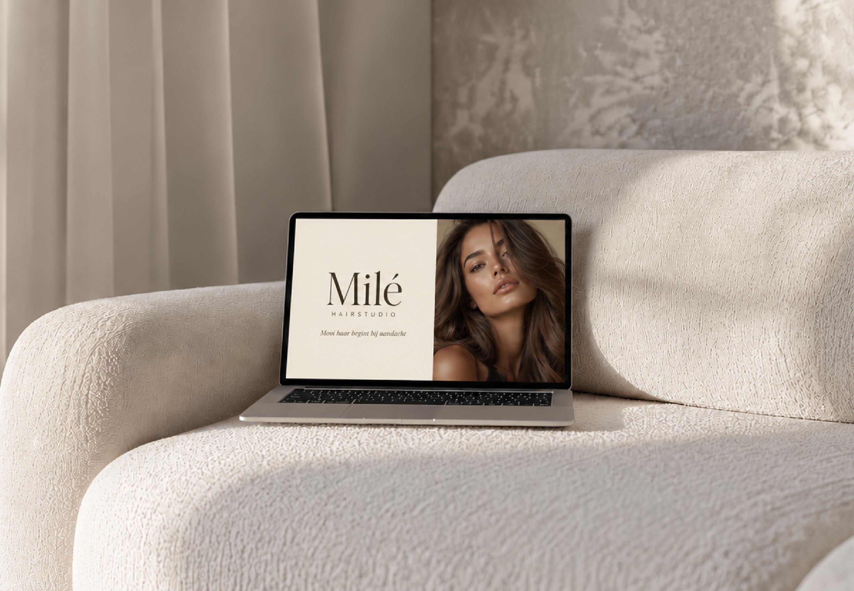 Milé website displayed on a laptop